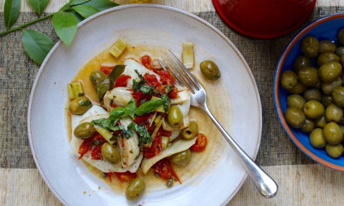 Baked fish with fennel, olives and basil