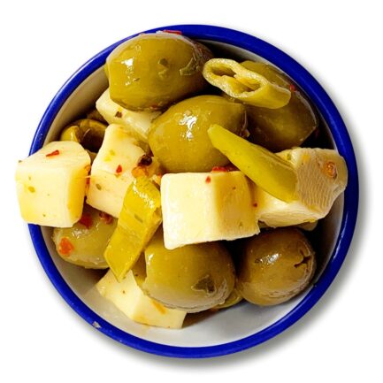 A bowl of olives, Cheddar and Macedonian peppers